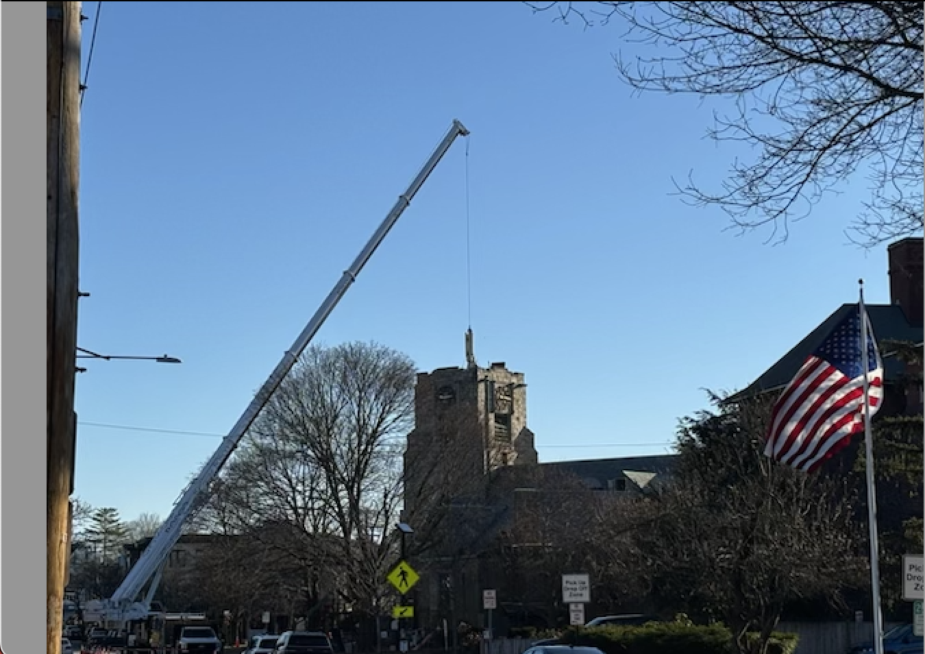 Crane next to church